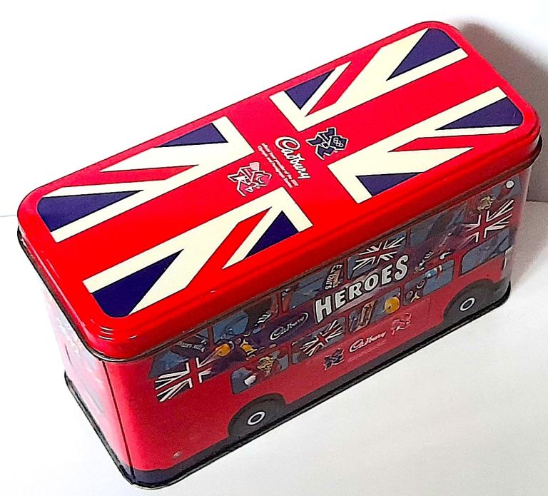 COLLECTABLE LIDDED TIN - 2012 LONDON OLYMPIC - CADBURY HEROES BUS 18 x 10 cm GOOD