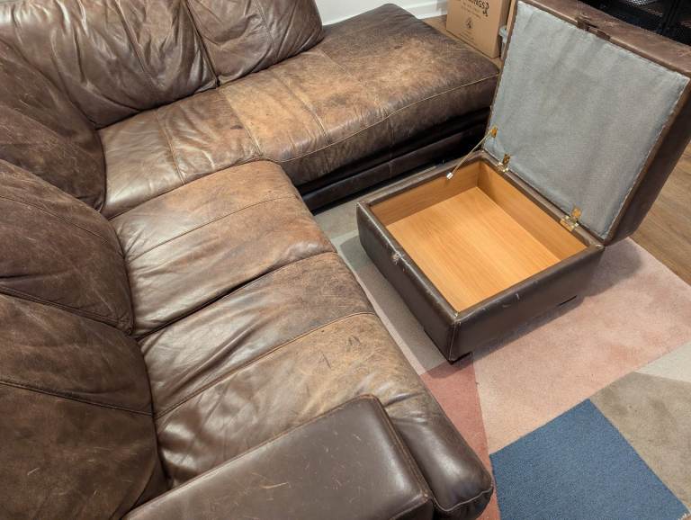 Brown leather corner sofa, with footstool storage