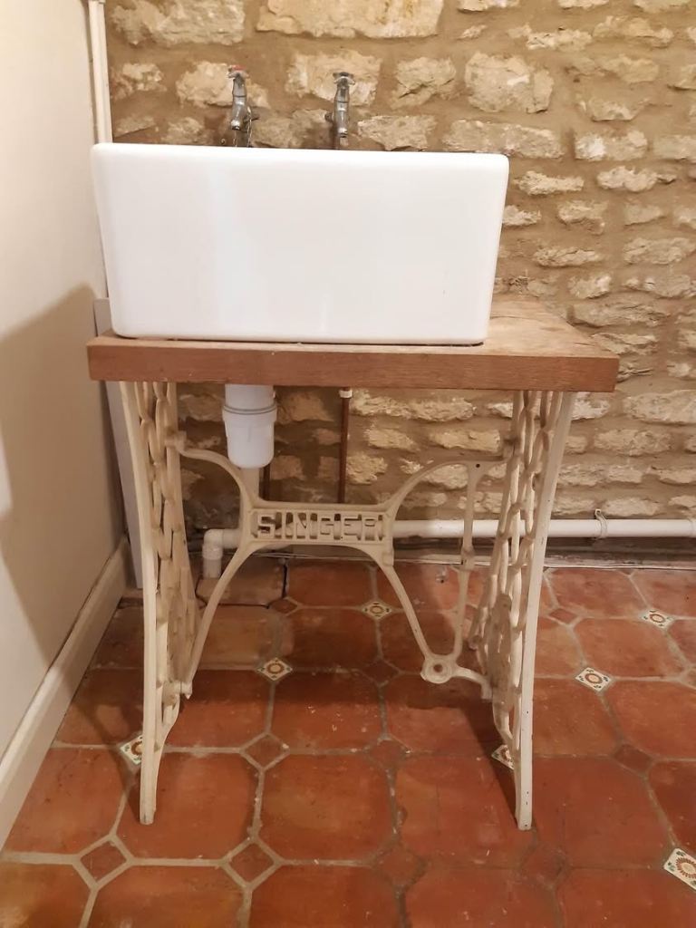 Belfast sink with wrought iron stand and Thick Oak top