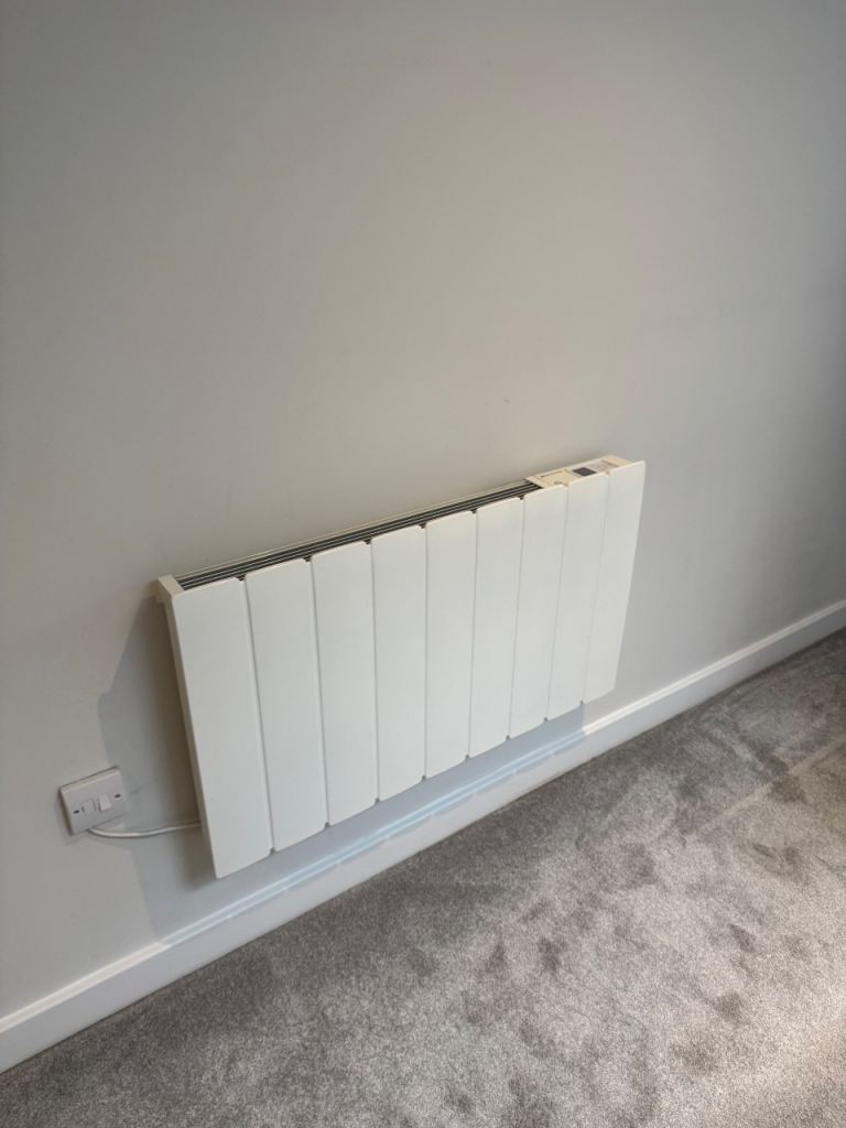 Four electric wall heaters 3 large / 1 small
