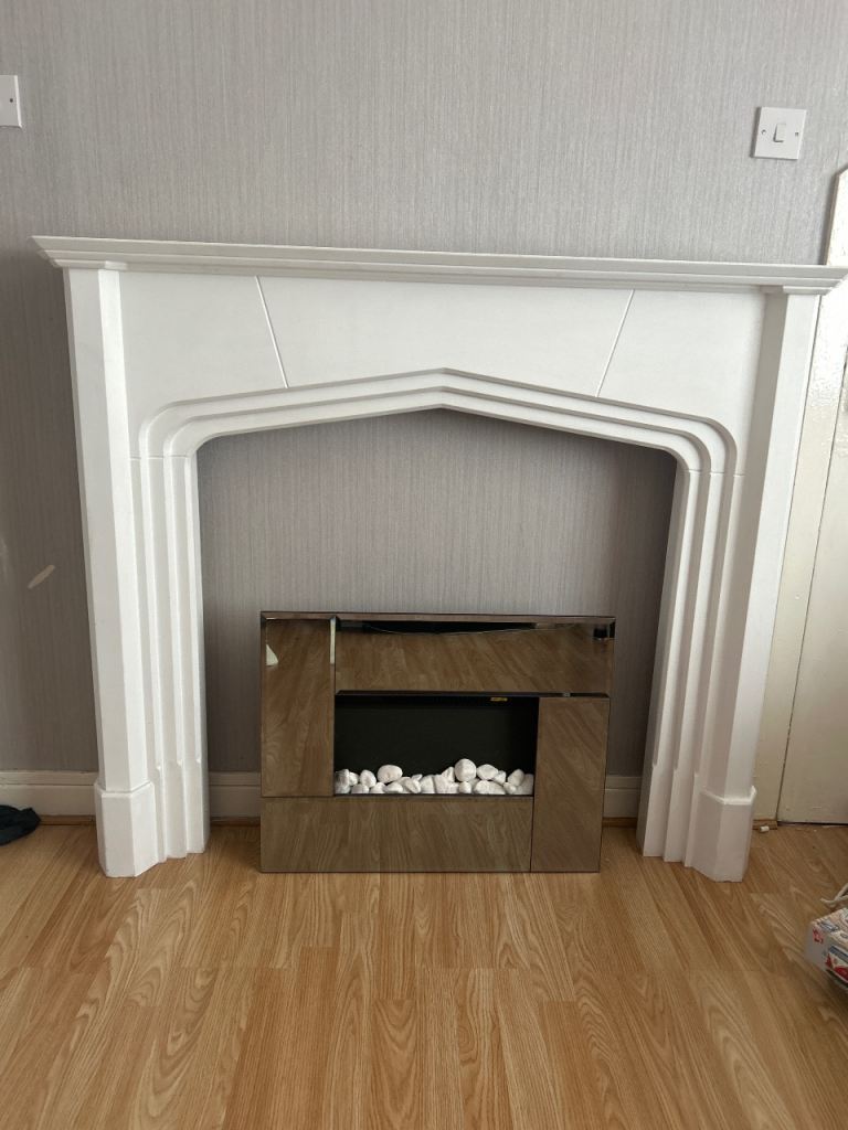 Mirror electric fire and white surround/fireplace with stone