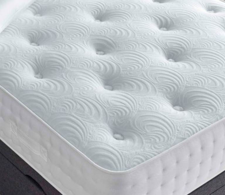 Deep Sleep king-size mattress for sale.