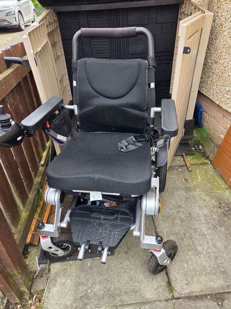 AS GOOD AS NEW Electric Mobility Chair, Black & Silver