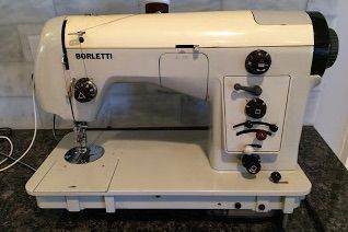 Famousa Borletti sewing machine of historical value. Might suit Collectors.