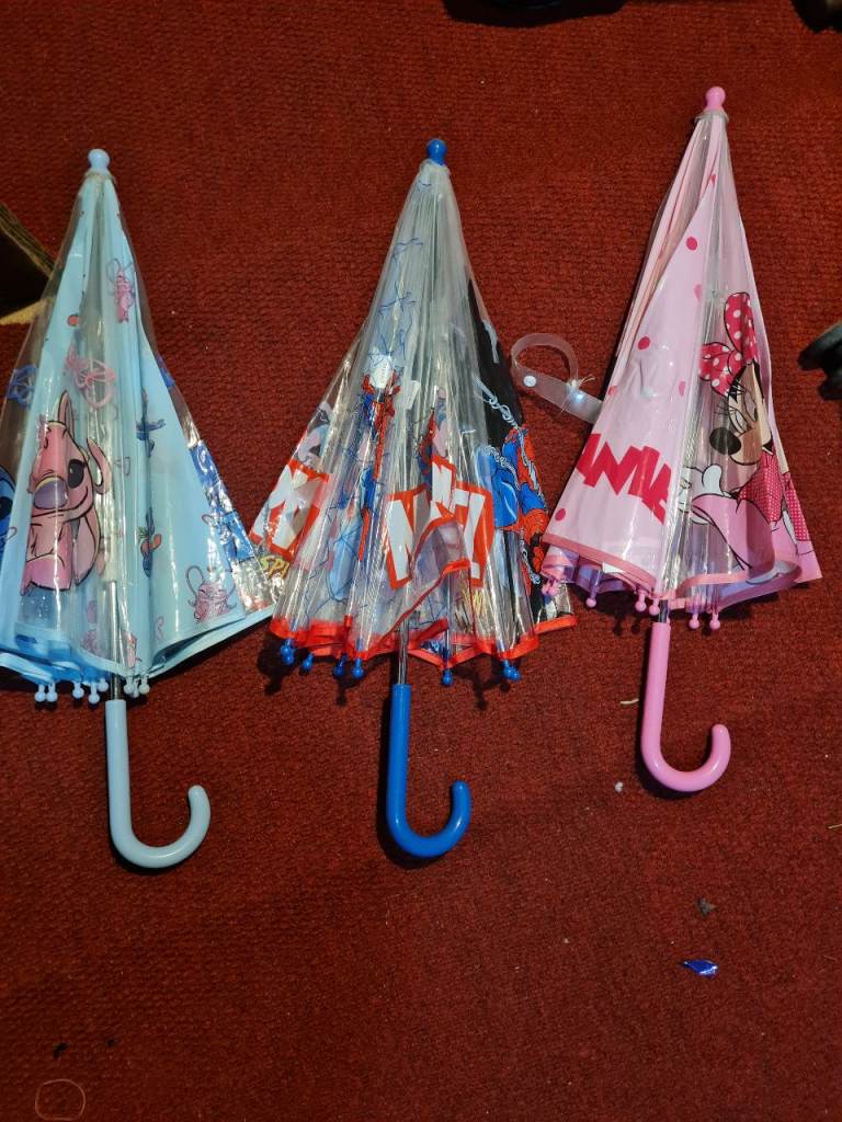 Kids Character Umbrellas - Stitch, Minnie Mouse, and clear design