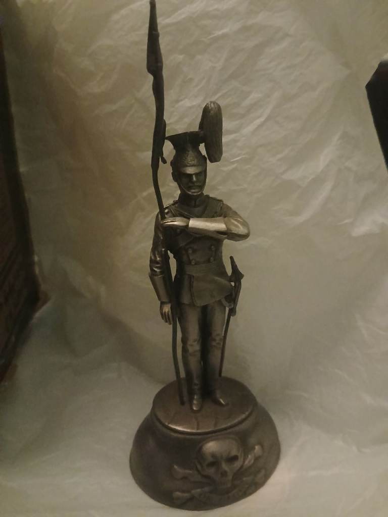 Pewter figure of a napoleonic Era Soldier with Skull & Crossbones Base