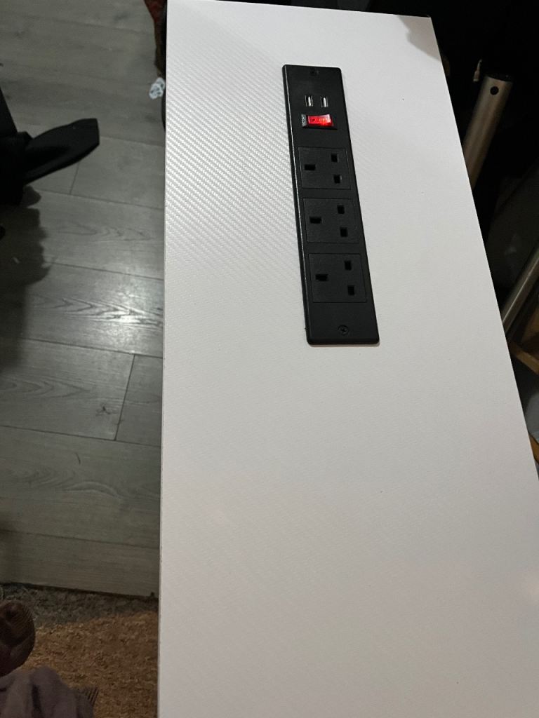 Table with plug in charger access 
