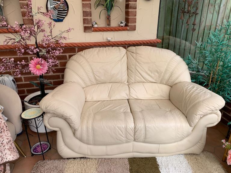 Cream Leather Two-Seater Sofa – Fair Condition
