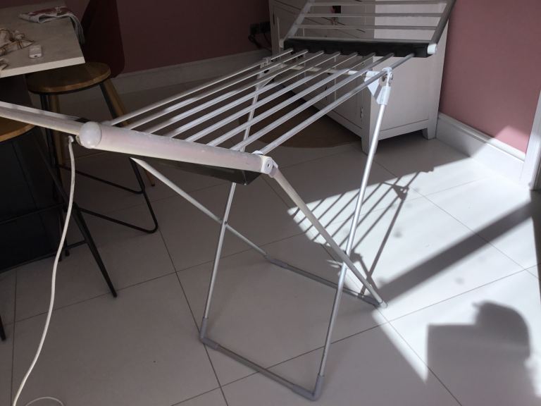 Heated clothes dryer