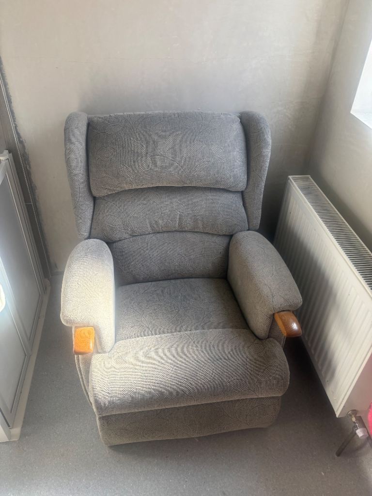 Comfortable Grey Fabric Armchair with Wooden Arms – Good Condition