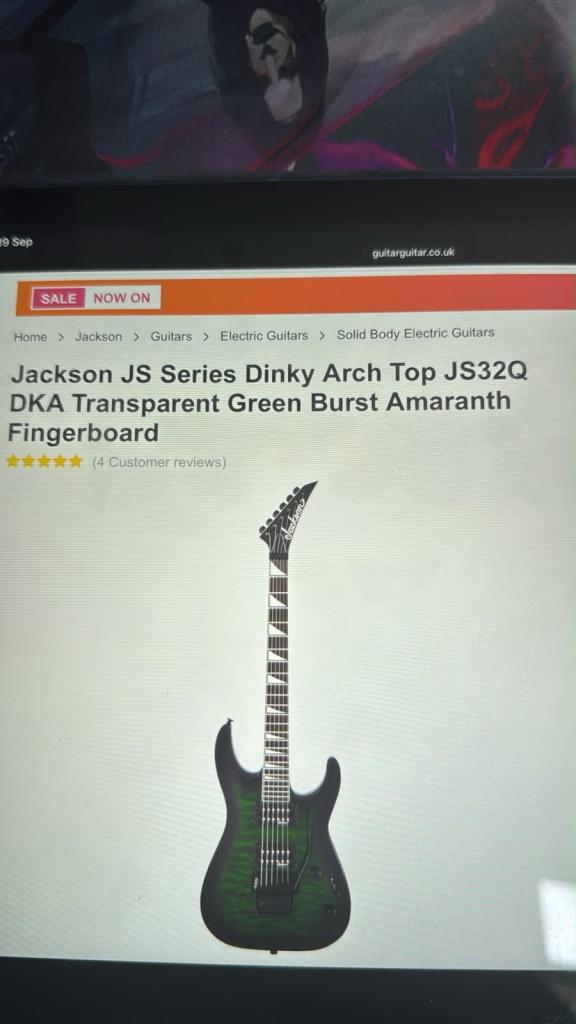 Electric guitar-Jackson dinky archtop JS32Q. Transparent greenburst amaranth fingerboard