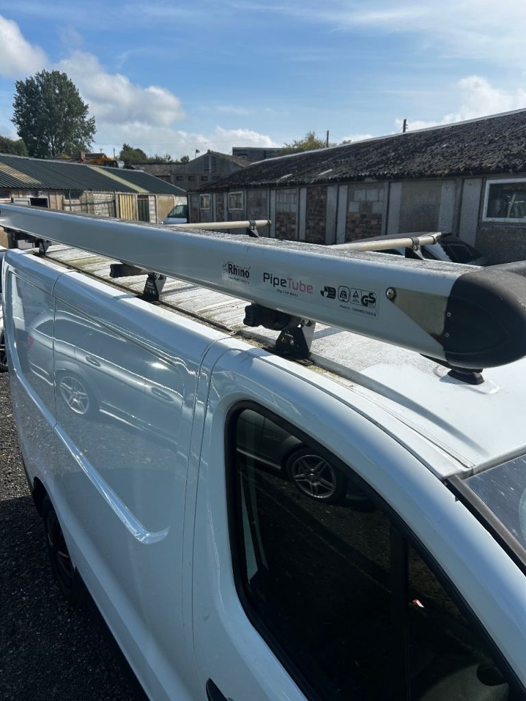 Vivaro trafic Rhino roof rack and Rhino pipe tube box 