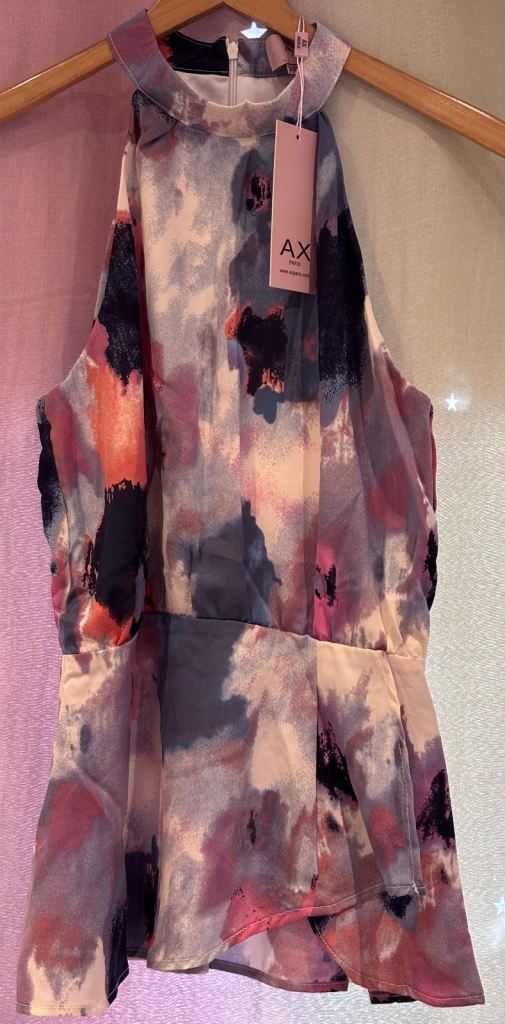 Ax peplum top