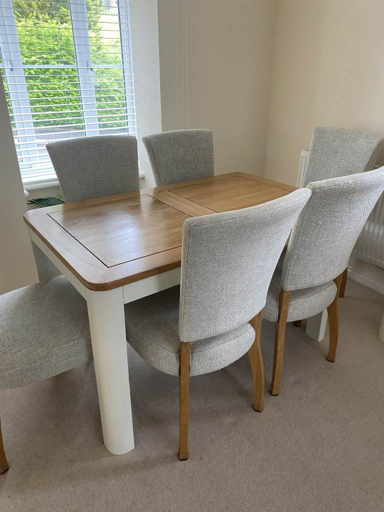 Extending Dining Table and Six Fabric Chairs