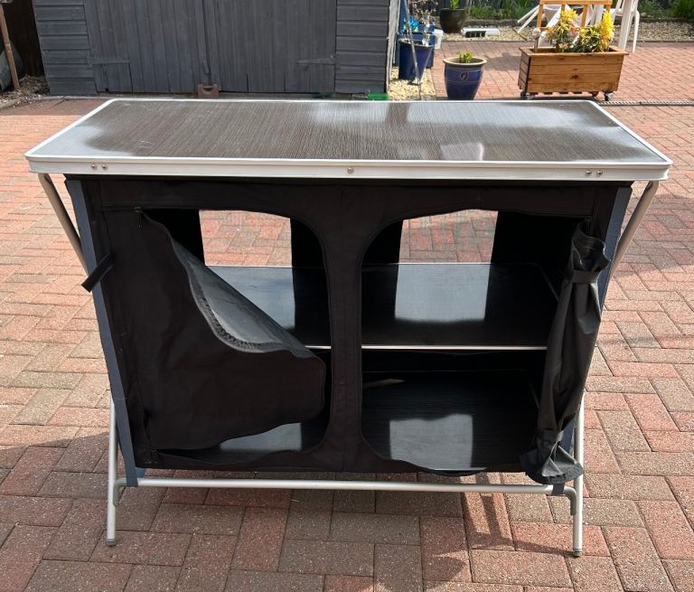 Awning storage shelves