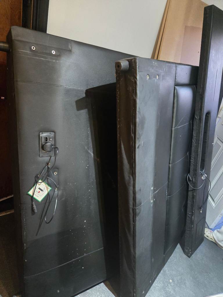 Black bed frame with tv lift. 