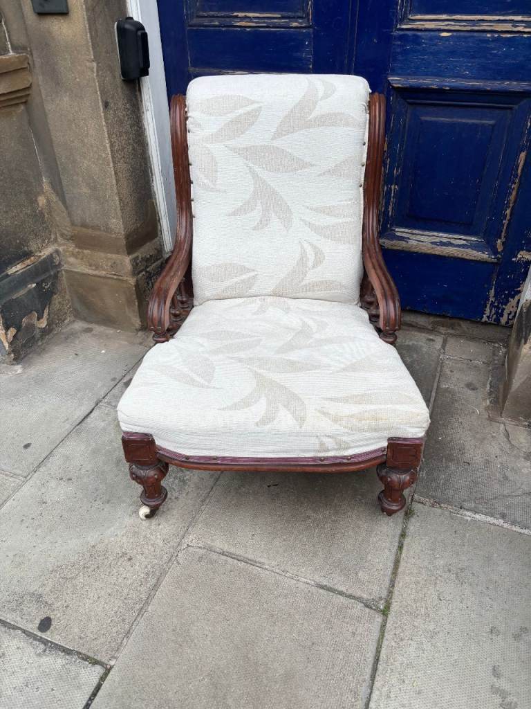 Antique low Chair , on castor wheels . Good quality and in good ...