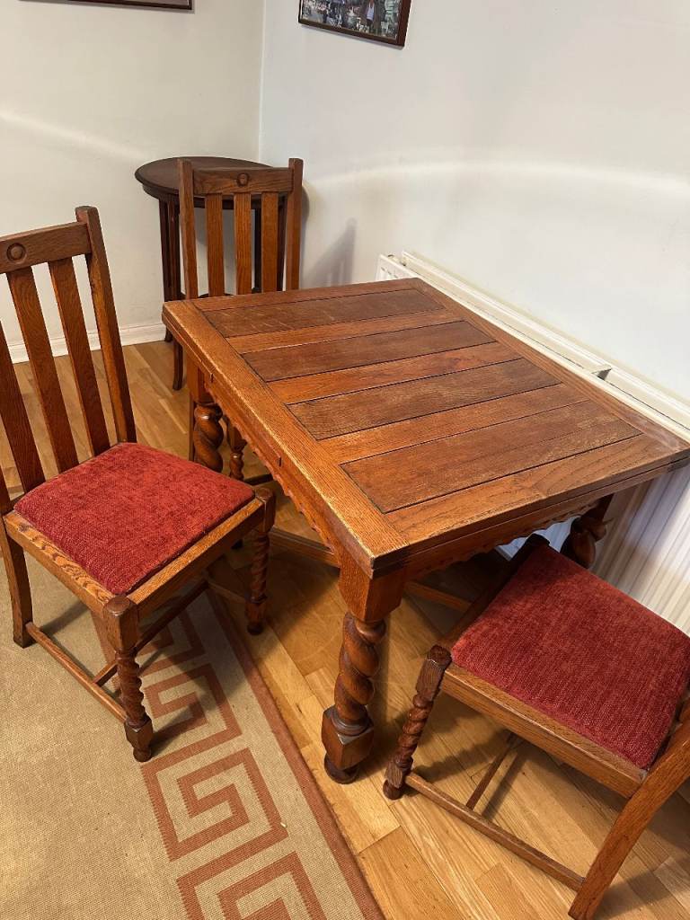 Antique oak barley-twist leg, extending dining table and three chairs