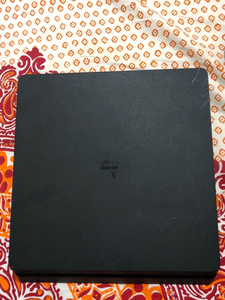 Sony PlayStation 4 Slim Console – Black, Good Condition
