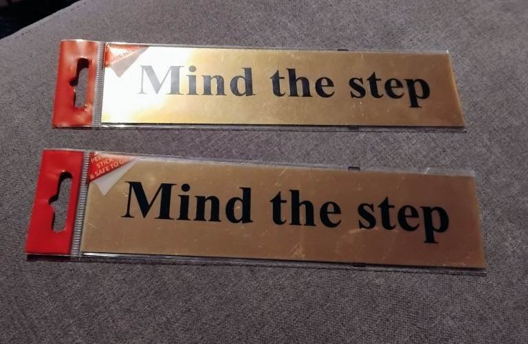 Two office/restaurant signs.