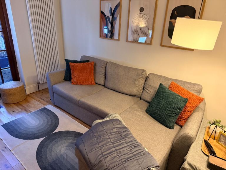 John Lewis Sansa Corner Sofa Bed with Storage – Saga Grey