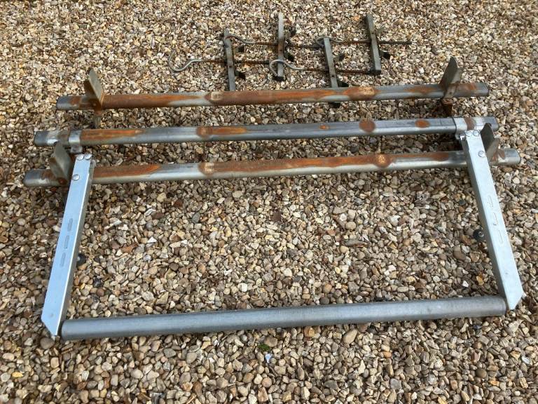 Van roof bars plus roller and ladder clamps 