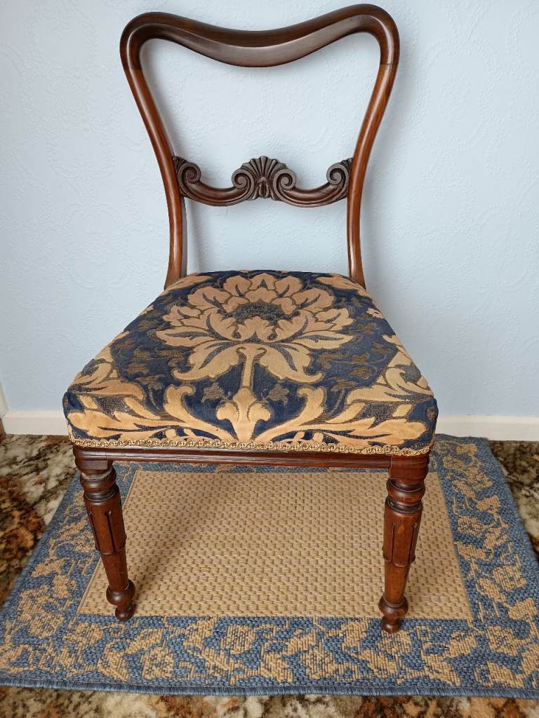 Antique chairs needing refurbishment 