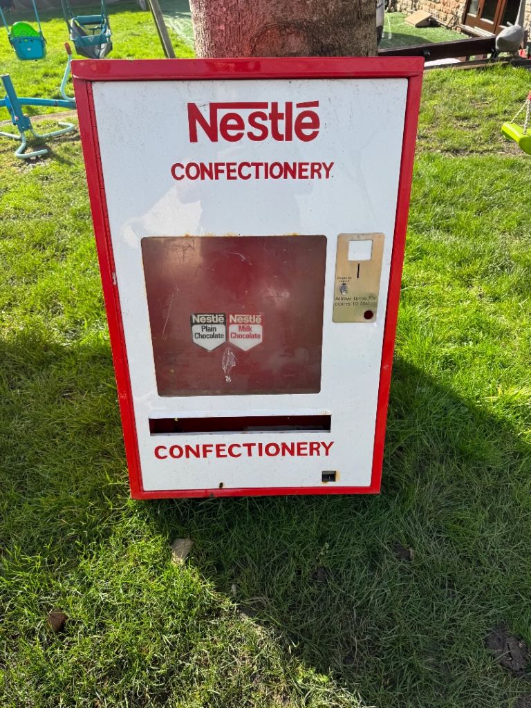 Vintage Nestle chocolate vending machine