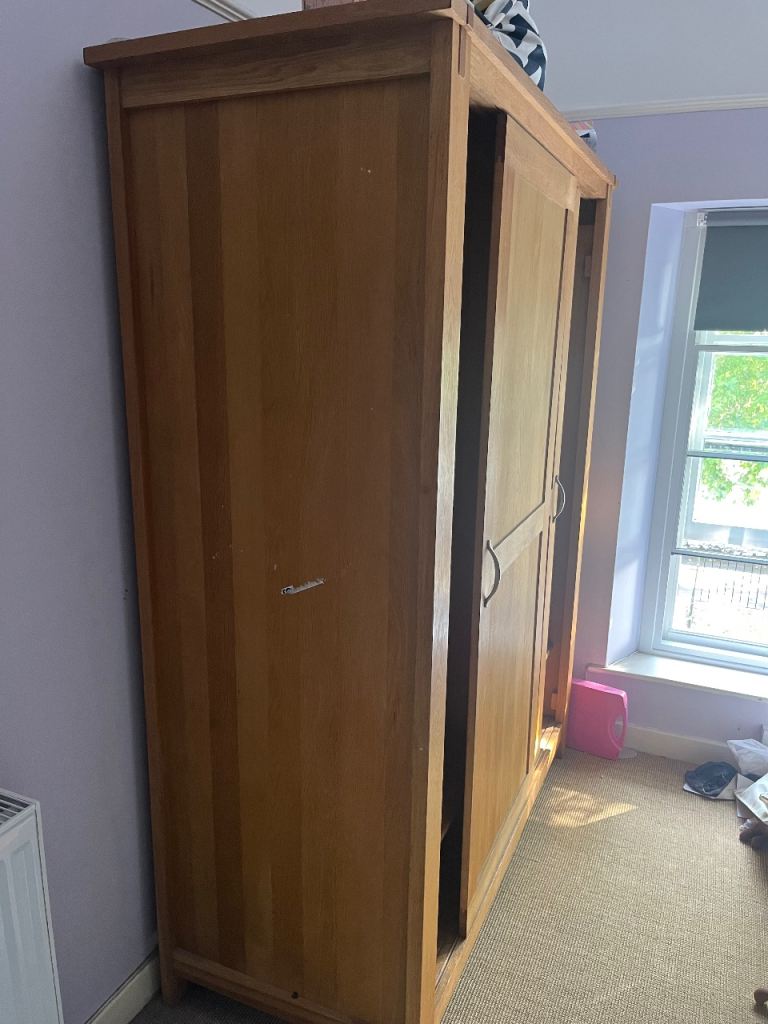 Wooden Wardrobe with Sliding Doors and Shelves – Good Condition
