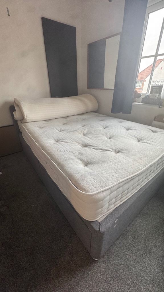 Double divan bed, two storage drawers.