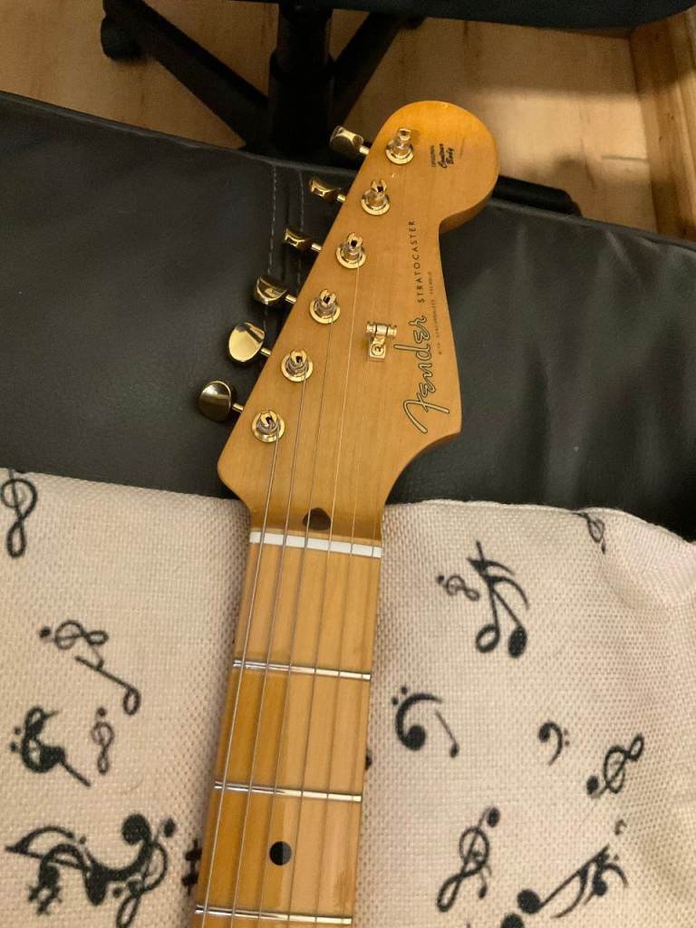 Fender Stratocaster with upgraded Fender gold hardware   