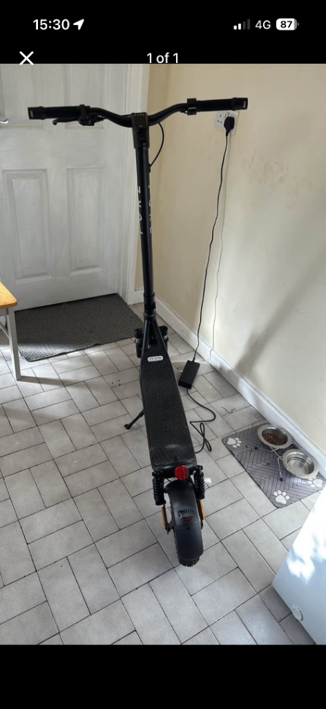 Electric Scooter with Charger – Black, Good Condition