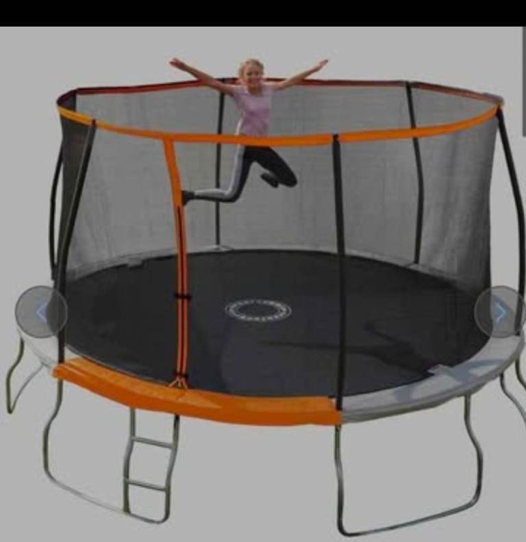 A new still boxed flat packed sportspower 14ft trampoline  with 