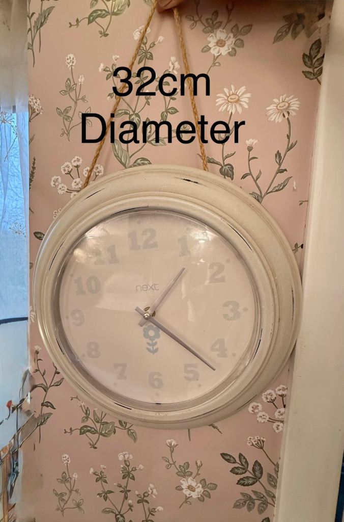 Lovely Next wall clock in a cream finish, perfect for any room.