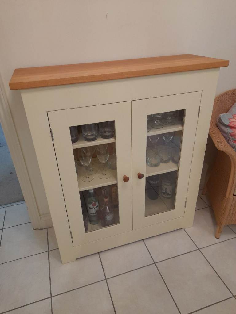 Majo furniture glass fronted 2 door display cream cabinet with oak top