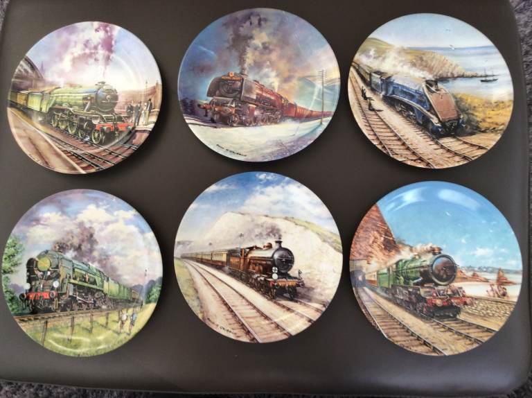 Set of six Davenport limited edition train plates.