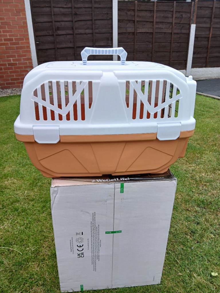 Dog carrier, bed and cage.