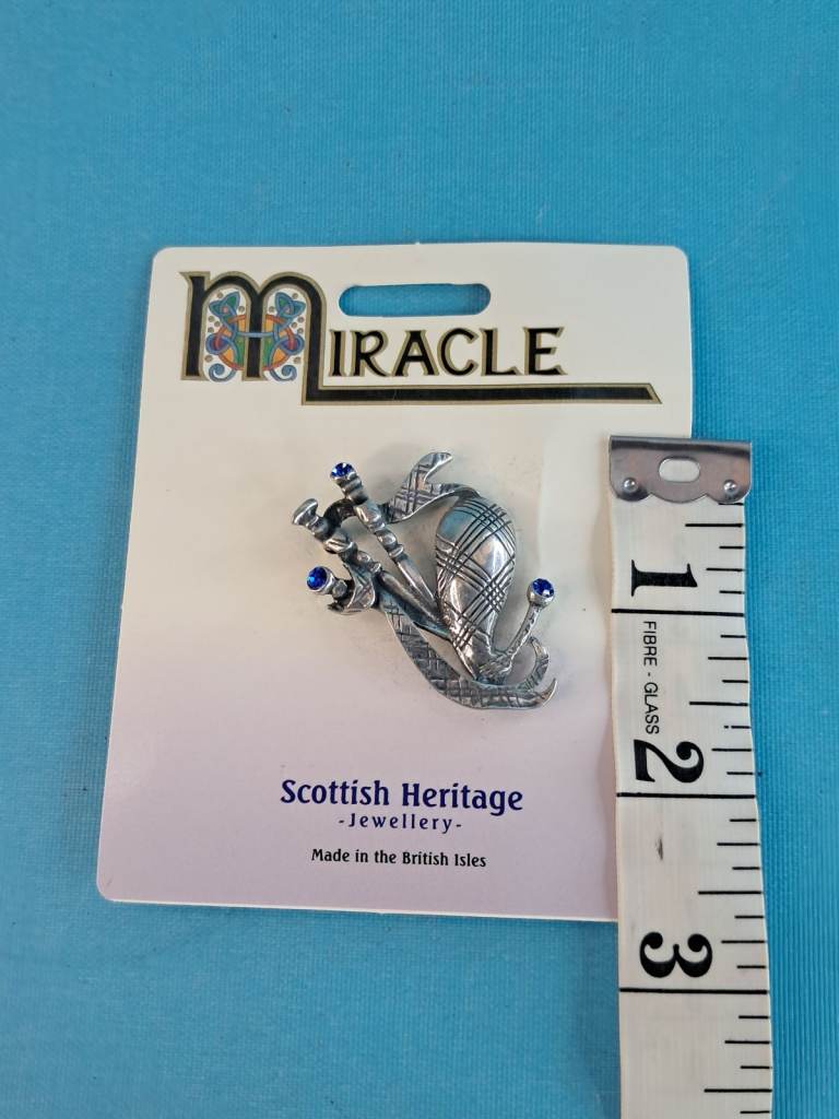 Miracle Scottish Heritage brooch, bagpipe and sword design with blue faux-sapphire stones