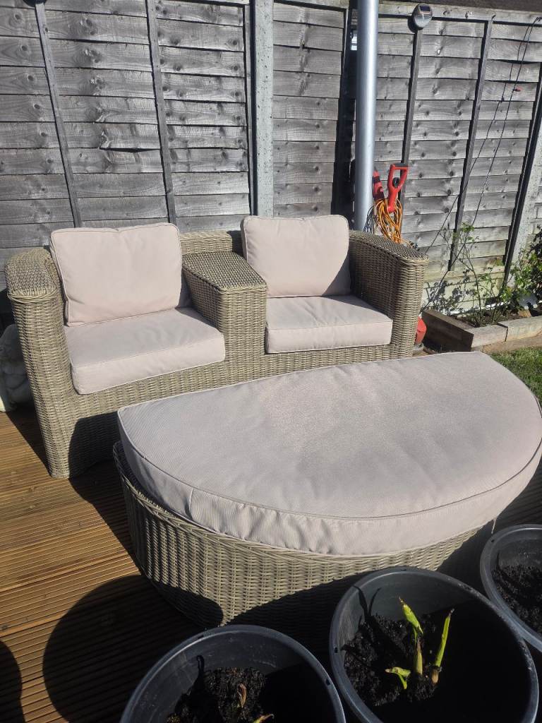 Rattan sofa plus footstall 