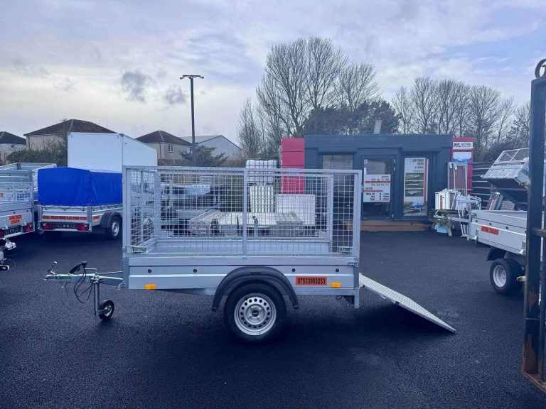 BRAND NEW 6FT X 4FT SINGLE AXLE TRAILER WITH 8OCM MESH AND RAMP 750KG