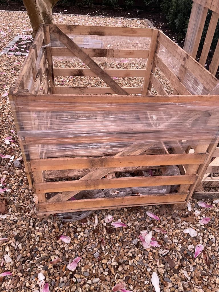 Free 2 x large wooden pallets containers