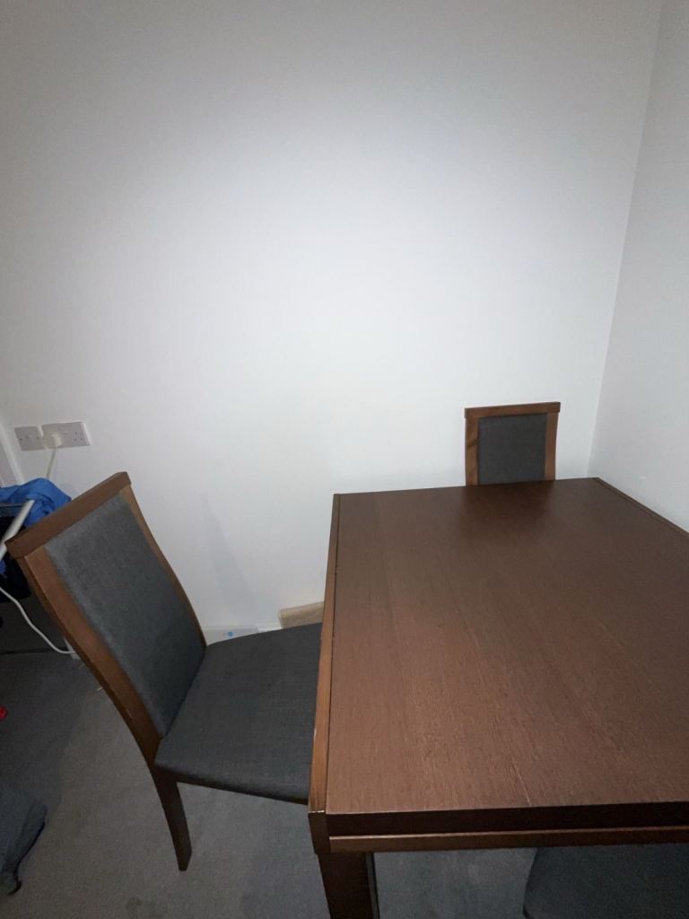 Walnut extendable dining table with 4 chairs