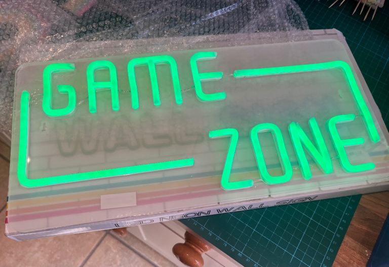 Green Game Zone neon sign. Boys bedroom