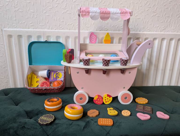 Wooden ice-cream cart with wooden accessories 