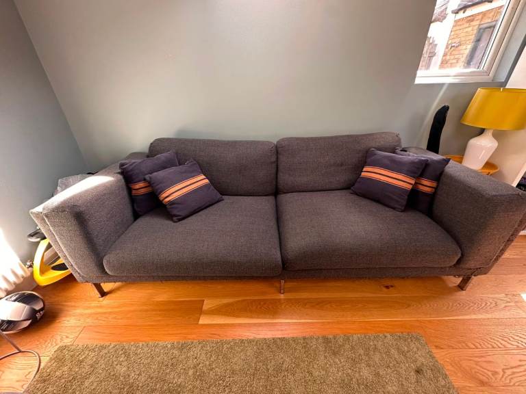 Grey Three-Seater Sofa with Cushions – Fair Condition