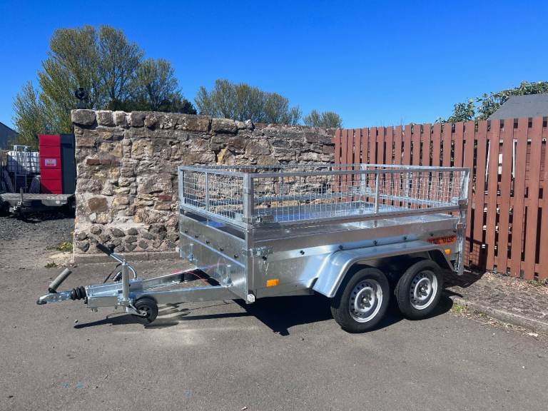 BRAND NEW 8,4FT X 5FT TWIN AXLE TRAILER WITH 40CM MESH 1300KG BRAKED