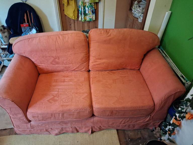 Orange 2 seater sofa