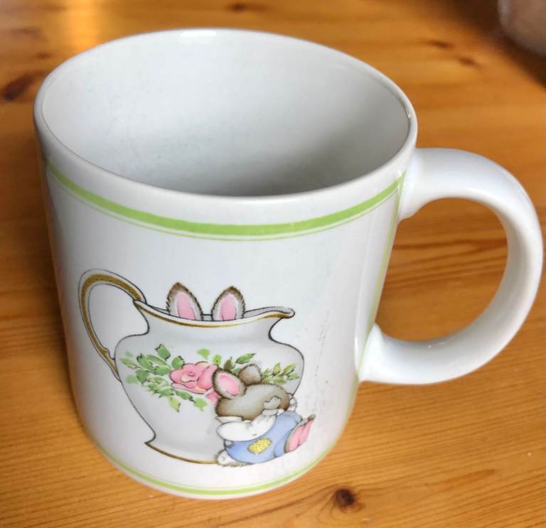CHINA MUG BY ANDREW BROWNSWORD, WITH RABBITS PICTURE