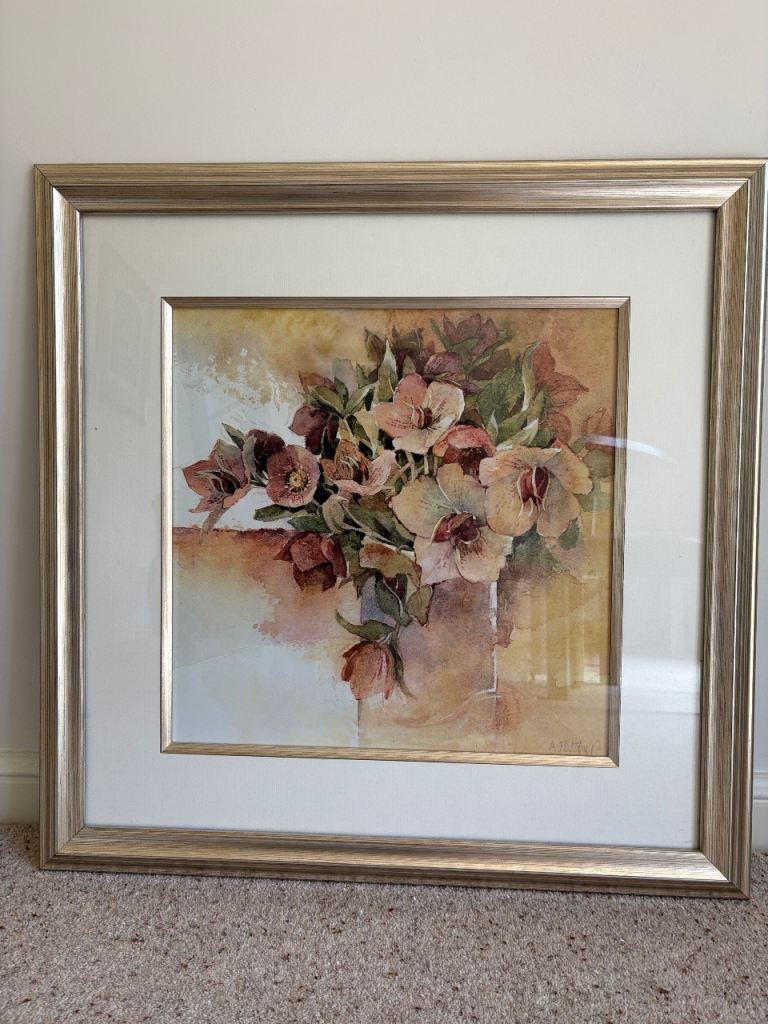 Large framed print of flowers with metallic frame