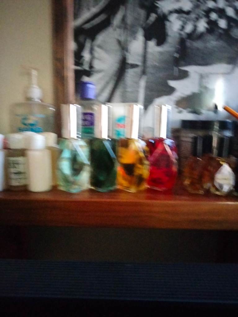 Selection of colourful perfume bottles – Good condition